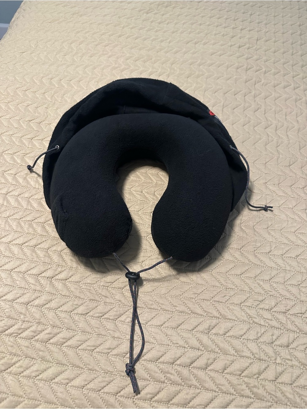 Travel Neck Pillow with built in hoodie as an eye shade from Grand Turk